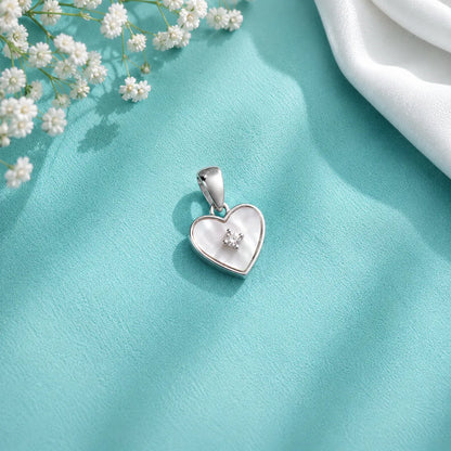 The Mother of Pearl Heart Solitaire Pendant - made with 925 Silver
